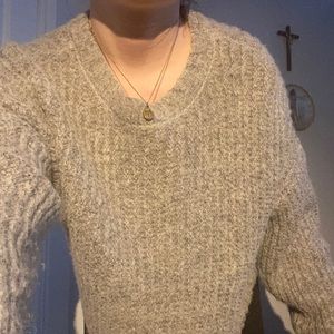 grey fuzzy sweater